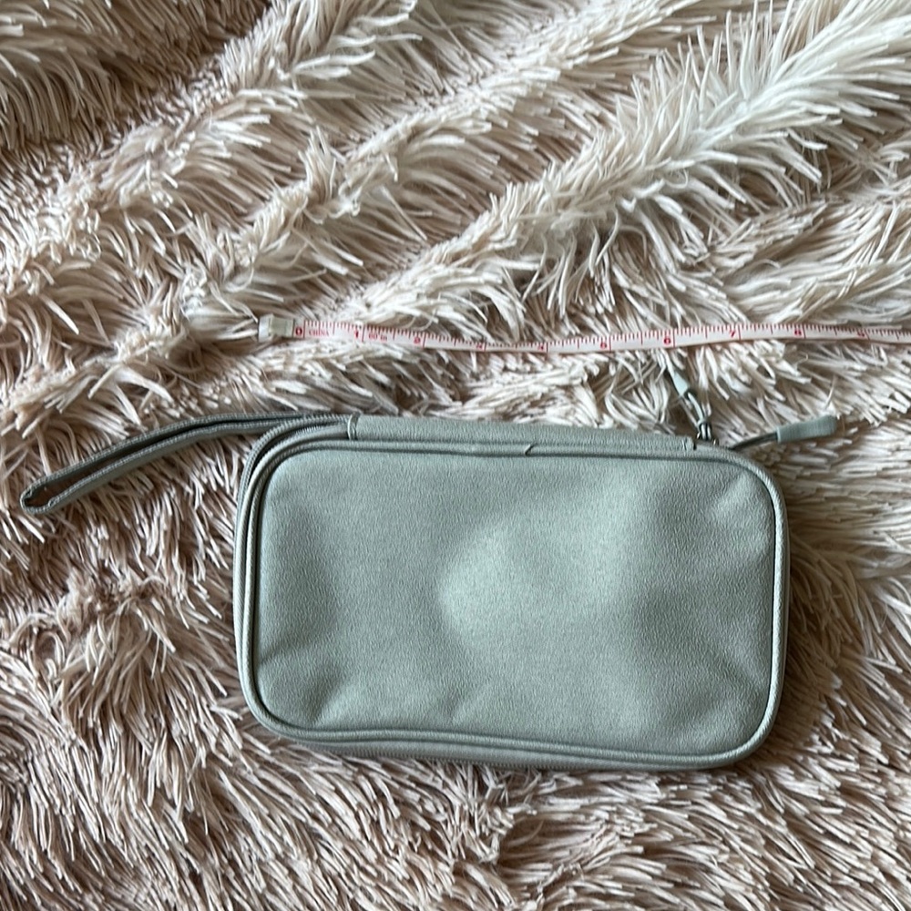 Gray tech organizer with wrist strap